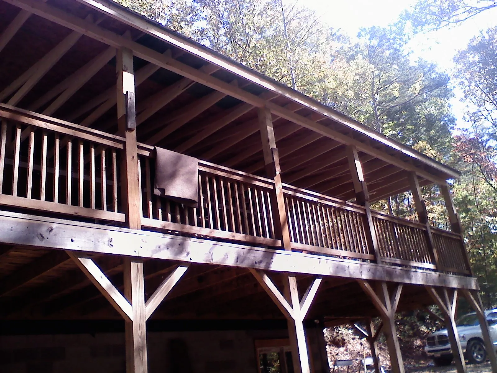 Timber framing under a new elevated porch and deck — Roof Leak Repair in New Cambria by Roofing Brothers